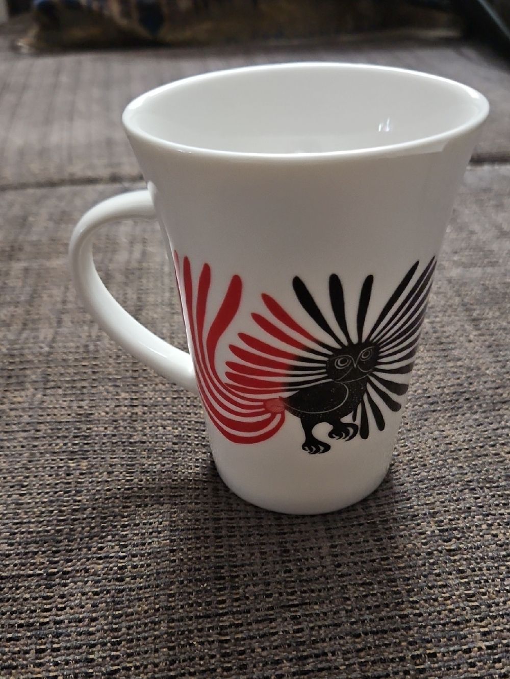 Oscardo Peaza Porcelain Mug By Kenojnak Ashevak